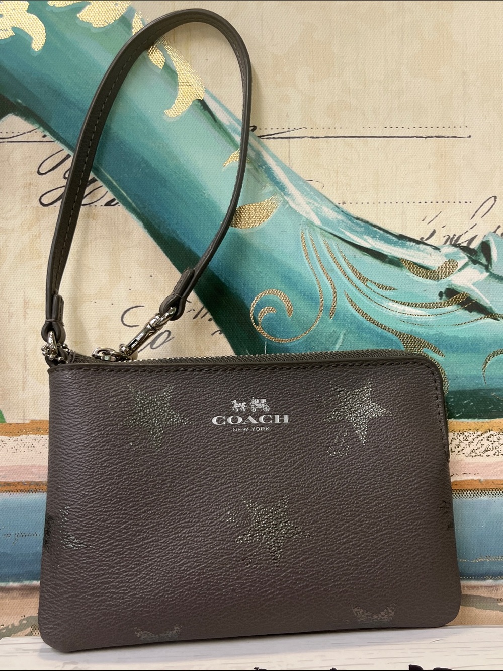 Coach Brown Star-Print Leather Wristlet